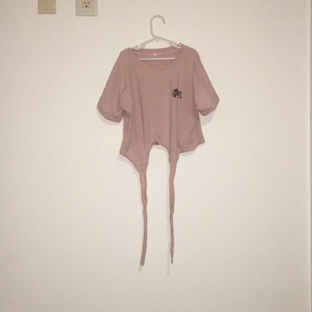 A pink crop top.